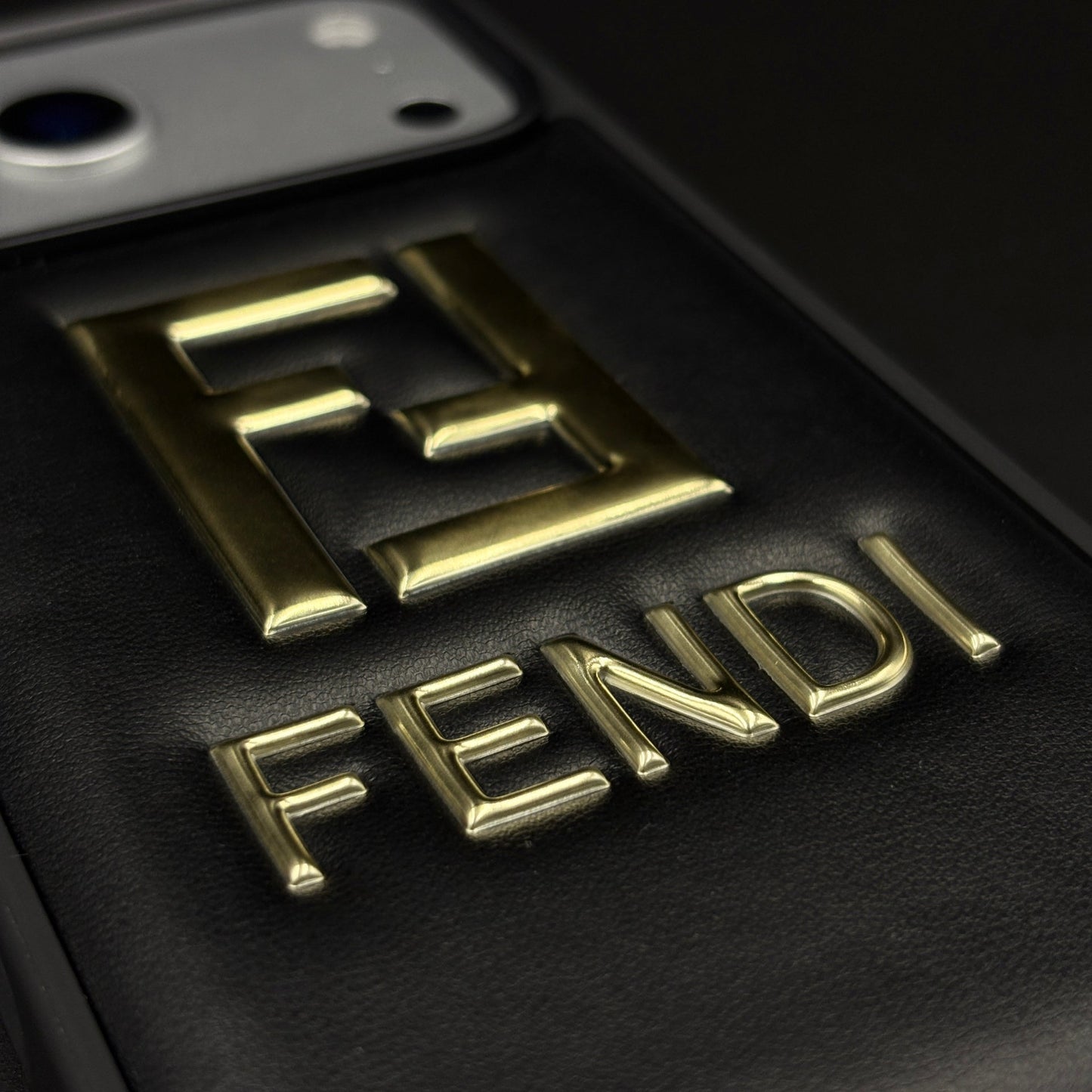 Gold Initial FF Emblem Puffer Mobile Case for iPhone 17 Series | Premium Black Cushion | Embossed Logo