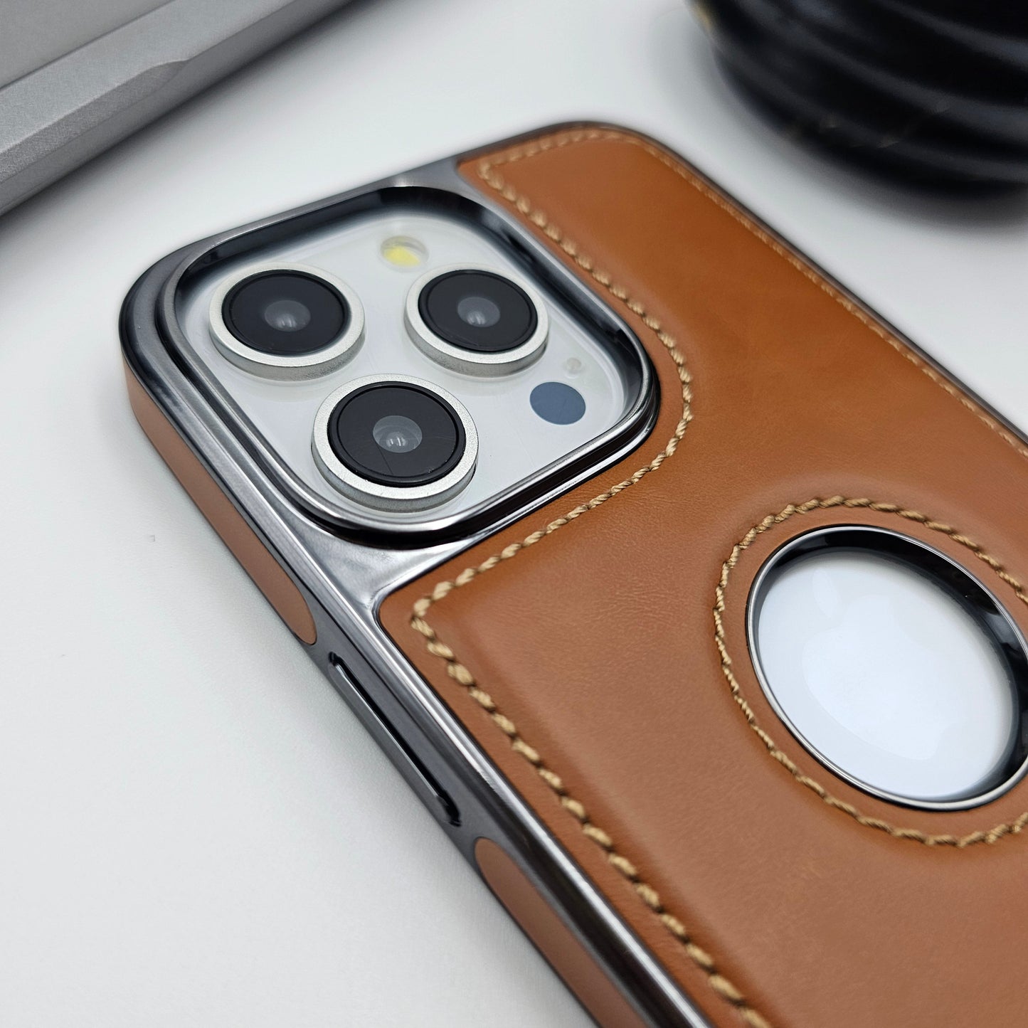 iPhone 16 Series Stitched Leather Logo Cut Chrome Case