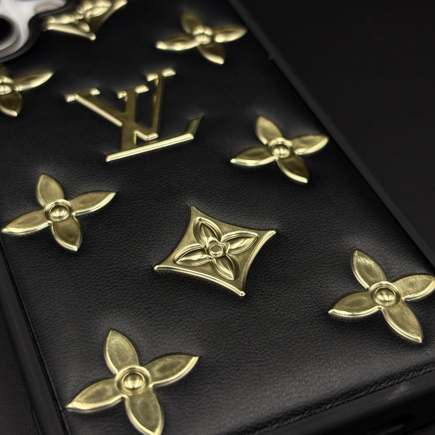 Luxury Embossed Gold Icon Mobile Case for iPhone 17 | Premium Black Soft-Touch Cushion Cover