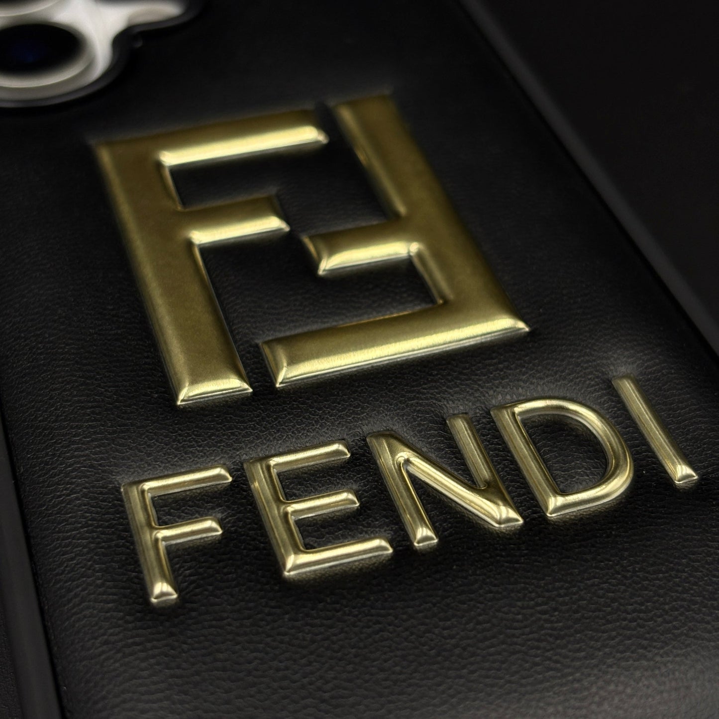 Gold Initial FF Emblem Puffer Mobile Case for iPhone 17 | Premium Black Cushion | Embossed Logo