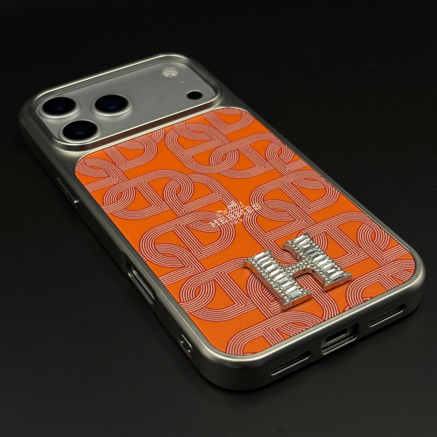 Luxury Branded Metal Initial Mobile Case Cover for iPhone 17 Series | Orange Designer-Inspired Matte Finish