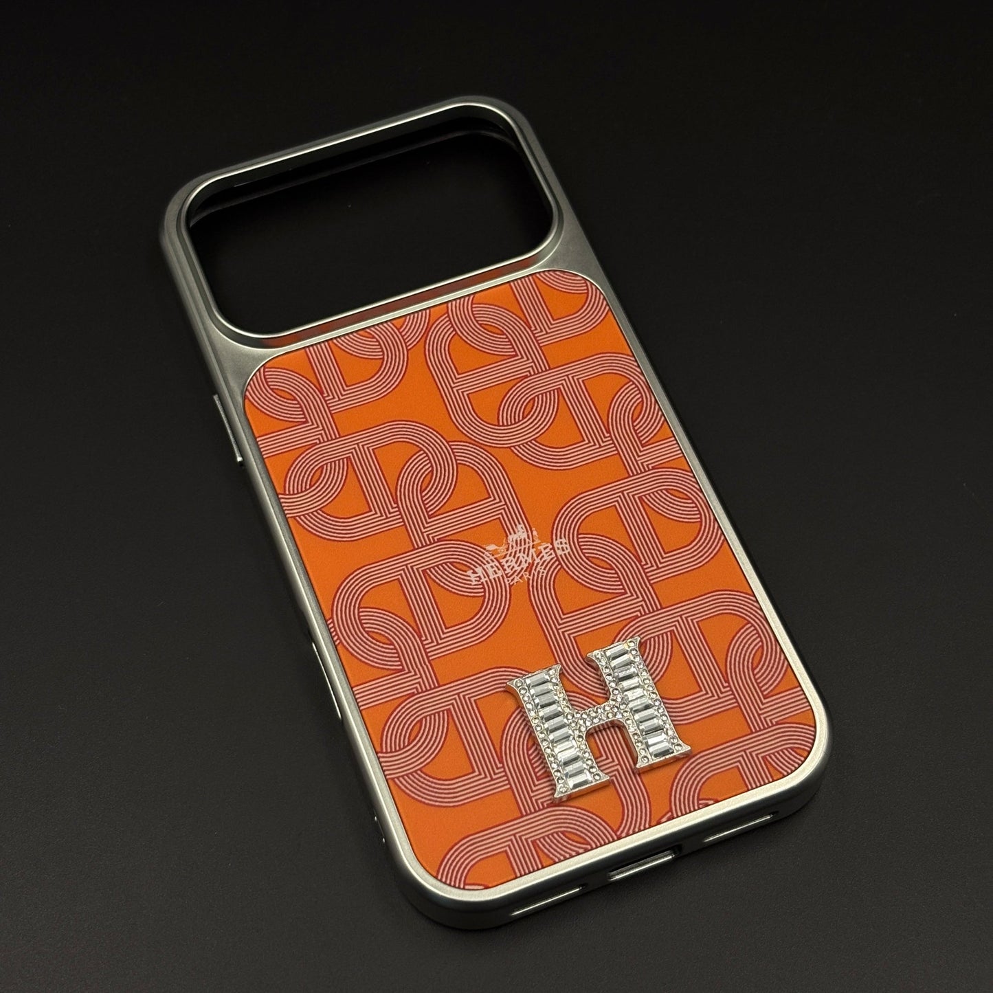 Luxury Branded Metal Initial Mobile Case Cover for iPhone 17 Series | Orange Designer-Inspired Matte Finish