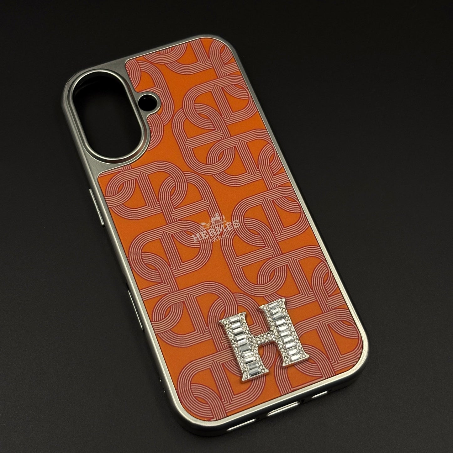 Luxury Branded Metal Initial Mobile Case Cover for iPhone 16 | Orange Designer-Inspired Matte Finish