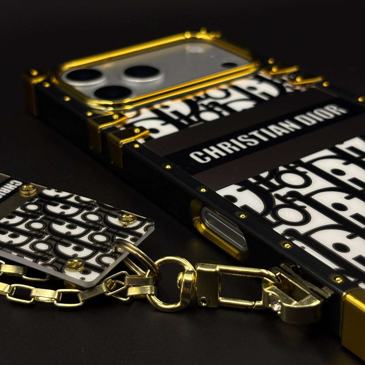 Luxury CD Trunk Phone Case Cover with Chain for iPhone 17 Series | Designer Metal Frame | Gold Monogram