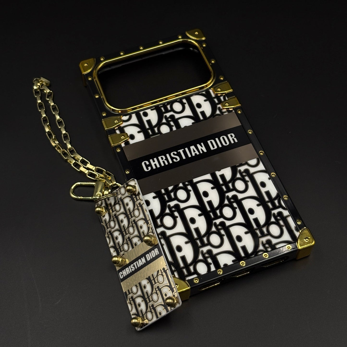Luxury CD Trunk Phone Case Cover with Chain for iPhone 17 Series | Designer Metal Frame | Gold Monogram